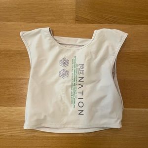 White PE nation sports bra worn only once. Name is preseason tee in optic white